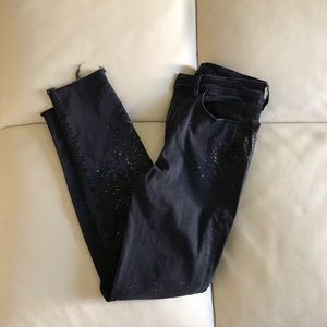 Joe’s paint splattered black jeans